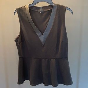 Dynamite Black peplum top. Faux leather Vneck trim.